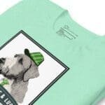 A Fur-tunite & Lucky Irish Wolfhound Dog For St.Patricks Day Unisex t-shirt with an image of a schnauzer wearing a hat, perfect for St. Patrick's Day.