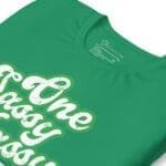 A One Sassy Lassy St. Patrick's Day unisex green t-shirt saying "one crazy person.