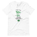 A white I Put The She in Shenanigans unisex t-shirt.