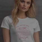 A woman wearing a white t-shirt with the product name, "REFUSE TO BE NORMAL Just Be You Motivational Quote Unisex T-Shirt".