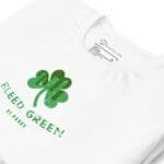 A Bleed Green St.Patricks Day Unisex t-shirt with a green shamrock on it.