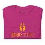A pink Halloween Eerie Unisex t-shirt with the phrase "errie-stable".