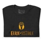 A Halloween Eerie Unisex t-shirt featuring a black owl.