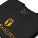 A black Halloween Eerie Unisex t-shirt with a yellow Halloween logo on it.