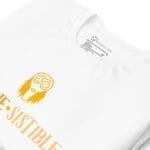 A Halloween Eerie Unisex t-shirt with an orange logo on it, perfect for Halloween.