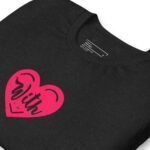 A With Love unisex black cotton t-shirt with a pink heart on it, symbolizing love.