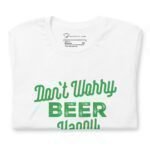 A white unisex Dont Worry Be Happy | St.Patricks t-shirt that says beer is good.