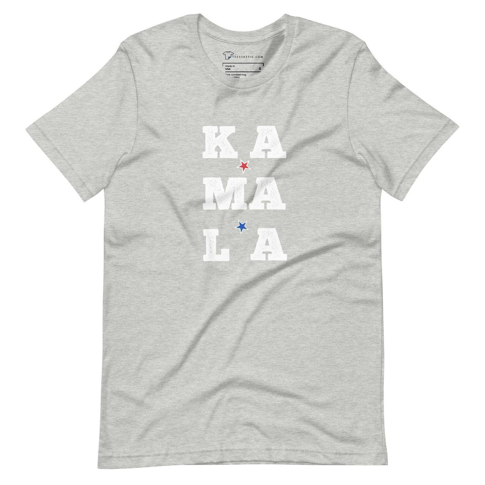 The "KAMALA | Elections 2024" unisex t-shirt in gray features the text "KAMALA" in white letters arranged in three vertical rows, with red and blue stars interspersed between the letters, making it a perfect choice to show your support ahead of the Elections 2024.
