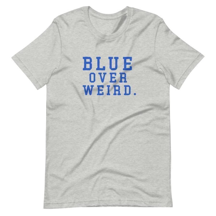 A unisex t-shirt in light gray featuring the bold blue text "BLUE OVER WEIRD." on the front, perfect for showcasing your unique style during Elections 2024 season.