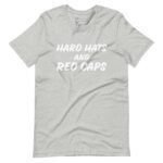 Show your support in Elections 2024 with the "Hard Hats And Red Caps" unisex t-shirt, featuring a bold white print on a stylish gray background.