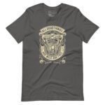 The "All Good Things Are Wild And Free" Unisex Heavy Cotton Tee in gray showcases a lion illustration accompanied by the phrases "All good things are wild and free" and "Respect Nature" in decorative fonts.