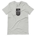 Gray short-sleeve unisex T-shirt featuring a black and white graphic with an airplane and text reading "Retired Aviator" on the front, perfect for any aviation pioneer.