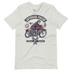 The Cafe-Racer Classic | Unisex Heavy Cotton Tee showcases a graphic design of a motorcyclist on a vintage bike with the text "Café Racer Classic" at the top.